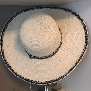 Panama style wide brim straw hat cream with navy blue trim